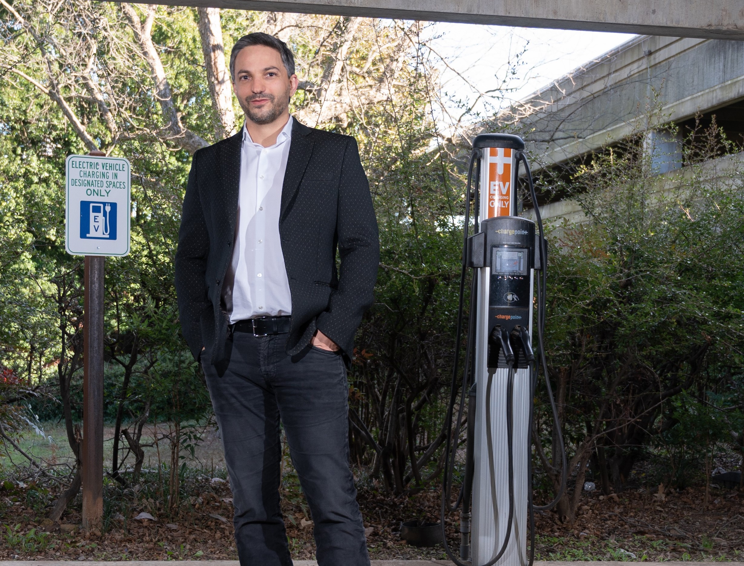 Gleb Yushin at EV charging station