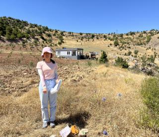 Georgia Tech graduate student Chang Ding pointing at a deployed seismic node in Southern Turkey