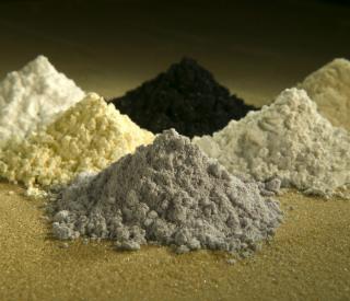 Piles of rare earth oxides praseodymium, cerium, lanthanum, neodymium, samarium and gadolinium. Peggy Greb/USDA-ARS