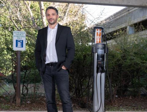 Gleb Yushin at EV charging station